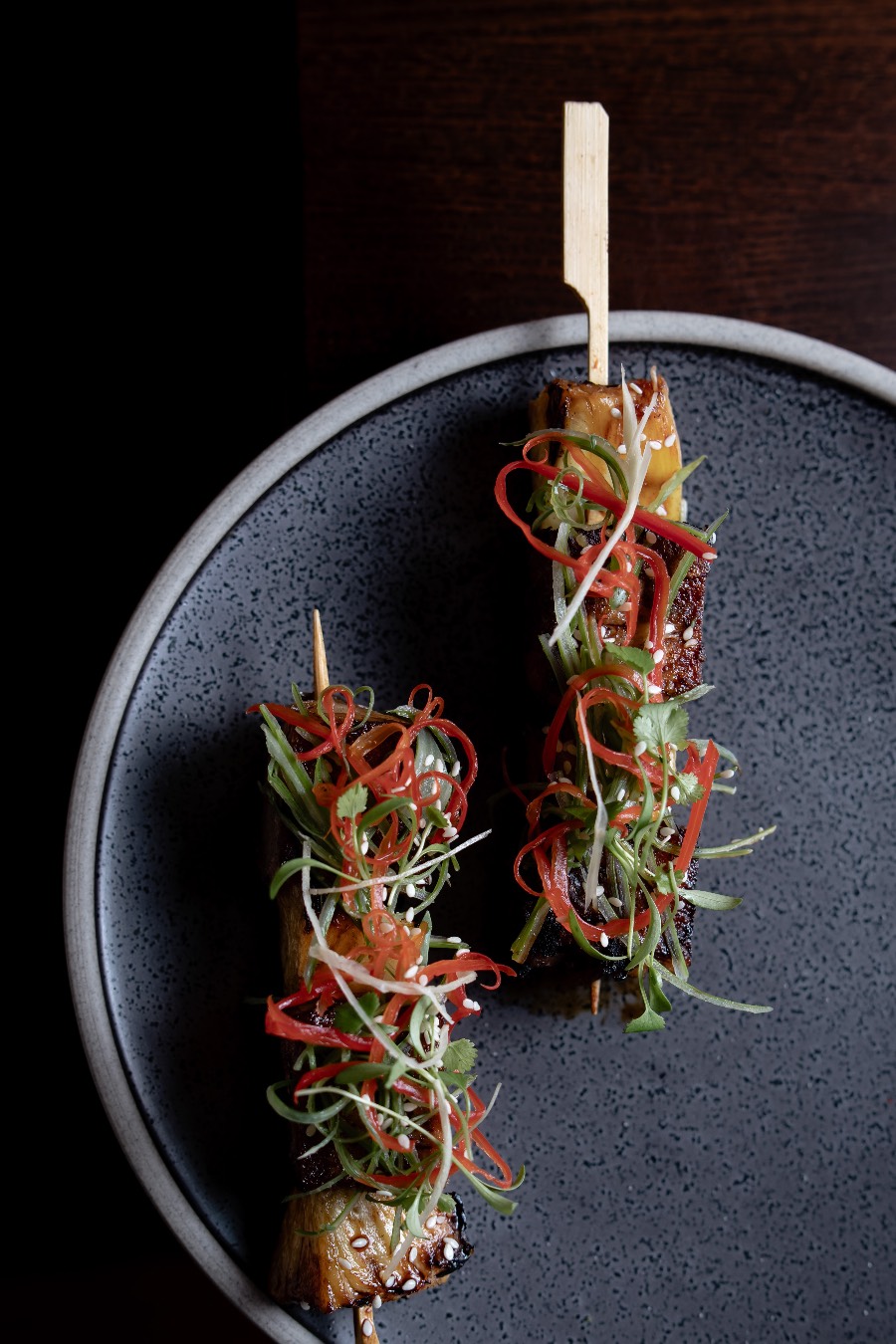 Char-grilled kebab skewers plated at GOAT, Auckland